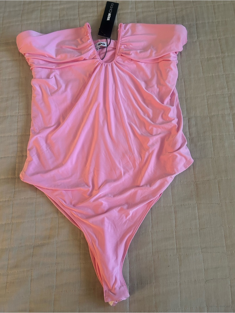Fashion Nova Pink women’s Vanity Ruched Strapless Bodysuit.